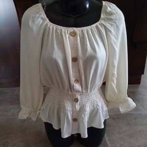 New Blouse creme with black buttond